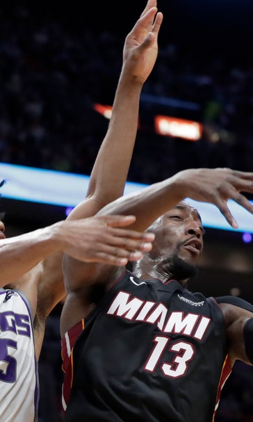Heat rally late, top Kings 118-113 in overtime